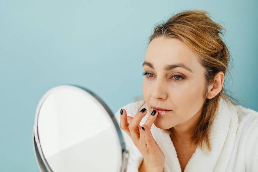 Image of applying ghee on lips
